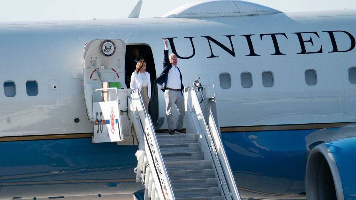 U.S. Vice President and democratic candidate for U.S. president Kamala Harris departs Airforce II with her chosen running mate Minnesota Gov. Tim Walz during a campaign stop in Romulus on Wednesday, Aug. 7, 2024.