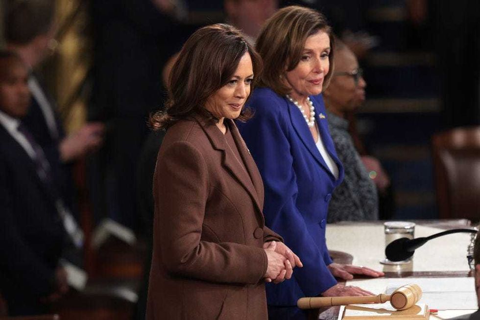 U.S. Vice President Kamala Harris (L) and Speaker of the House Nancy Pelosi (D-CA) wait for the arrival of President Joe Biden before he delivers the State of the Union address in the U.S. Capitol