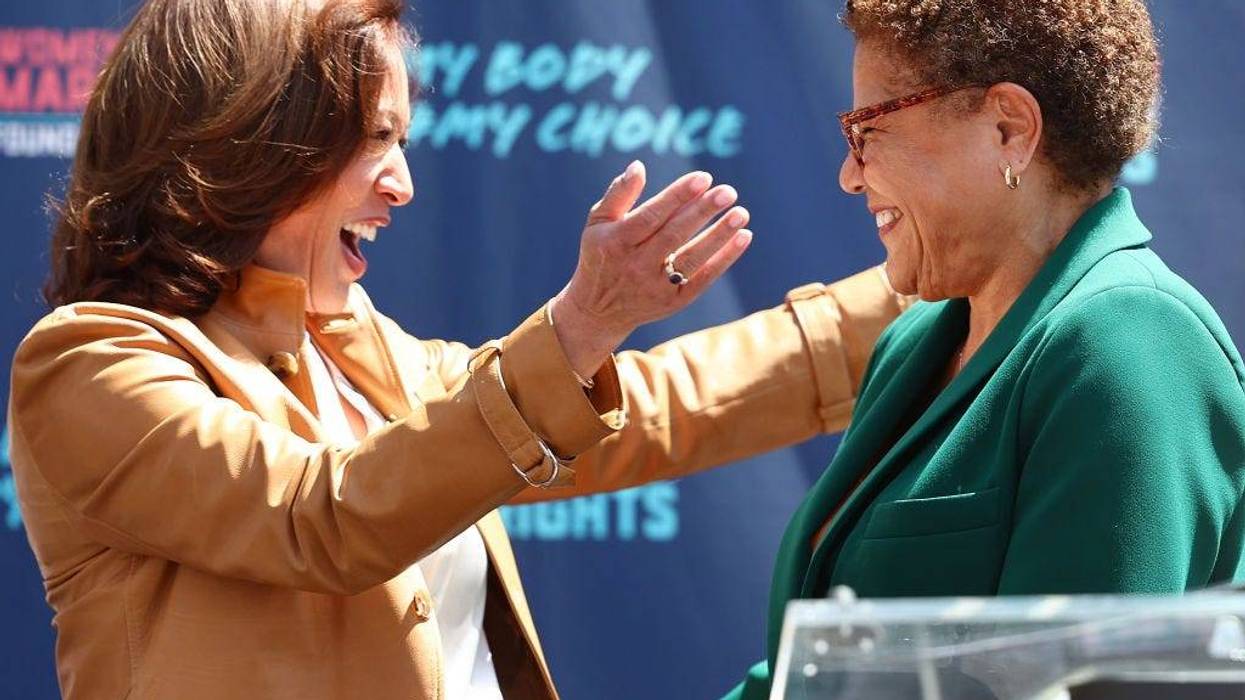 U.S. Vice President Kamala Harris (L) prepares to embrace Los Angeles Mayor Karen Bass during a surprise appearance at the March for Reproductive Rights organized by Women’s March L.A. on April 15, 2023 in Los Angeles, California.