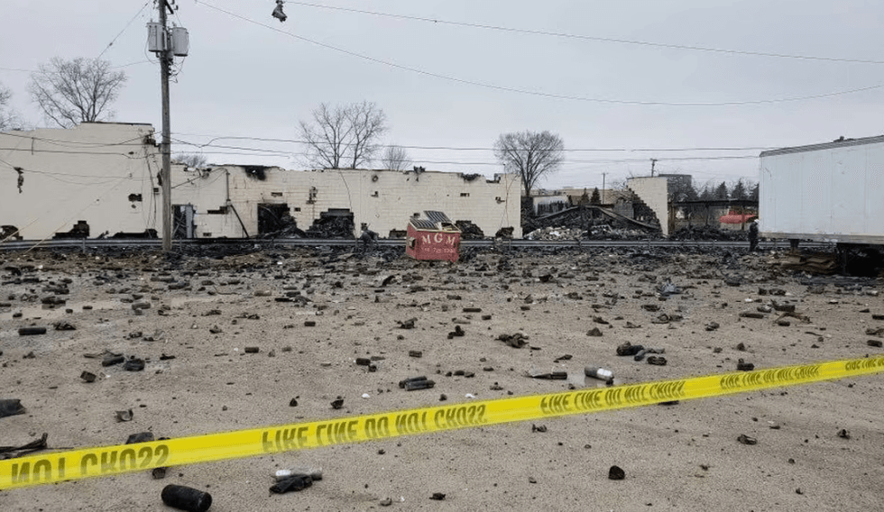 \u200bDebris is seen in the aftermath of a massive fire at a Clinton Township business.