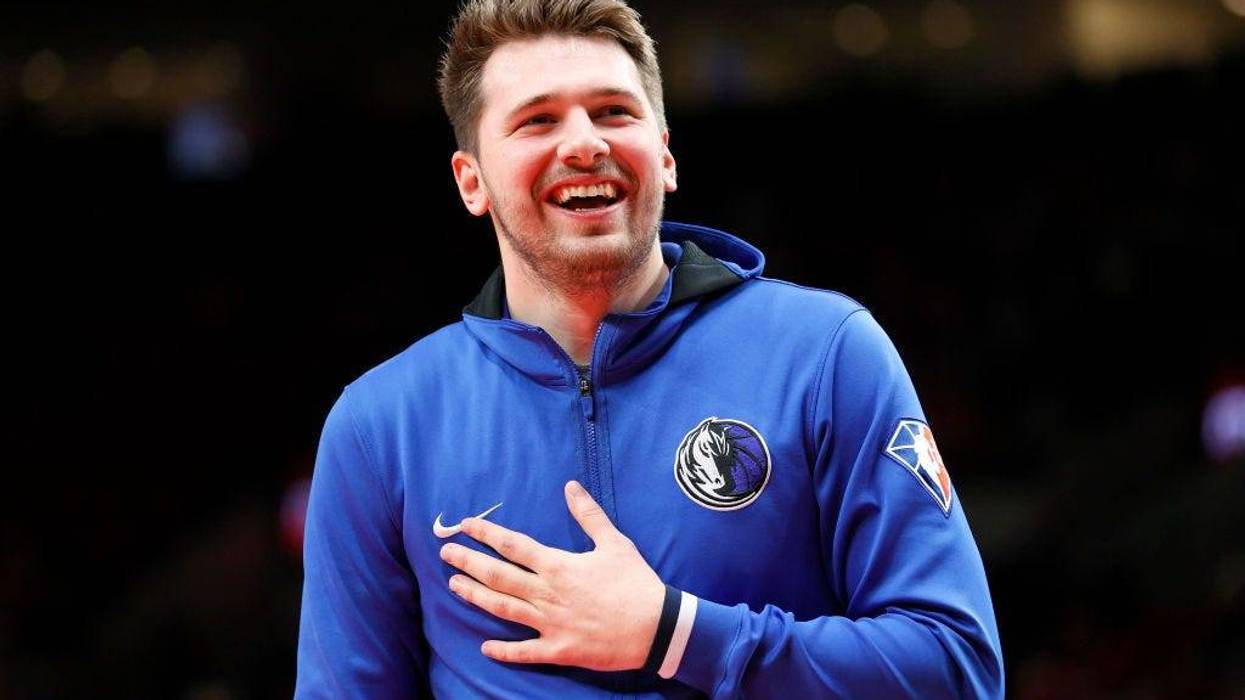 uka Doncic #77 of the Dallas Mavericks laughs before the game against the Portland Trail Blazers at Moda Center on January 26, 2022 in Portland, Oregon.