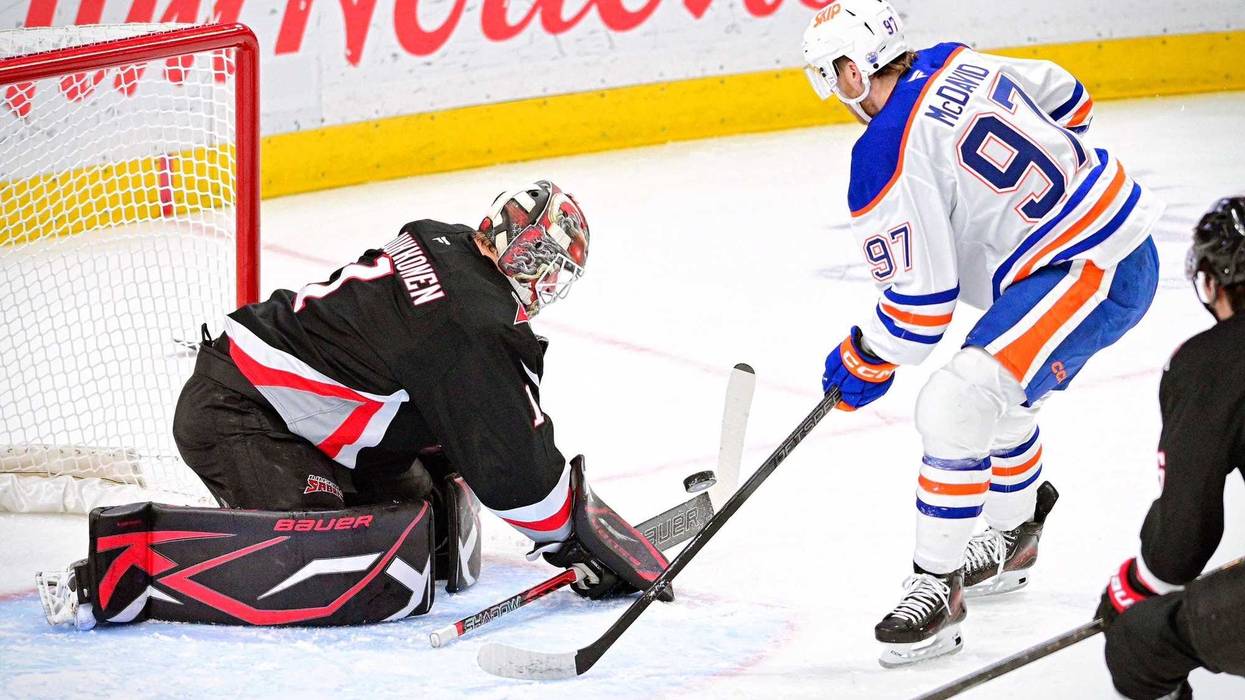 Ukko-Pekka Luukkonen and Connor McDavid