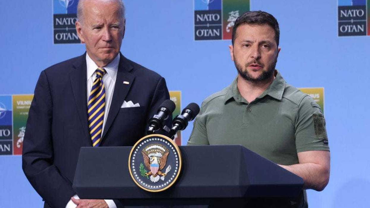 Ukrainian President Volodomyr Zelensky (R) speaks at the announcement of the G7 nations' joint declaration for the support of Ukraine as U.S. President Joe Biden looks on on July 12, 2023 in Vilnius, Lithuania. The event took place at the 2023 NATO Summit. (Photo by Sean Gallup/Getty Images)
