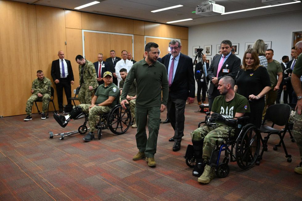 Ukrainian President Volodymyr Zelenskyy visits with wounded Ukrainian soldiers at the Staten Island University Hospital on Staten Island on Sept. 18, 2023