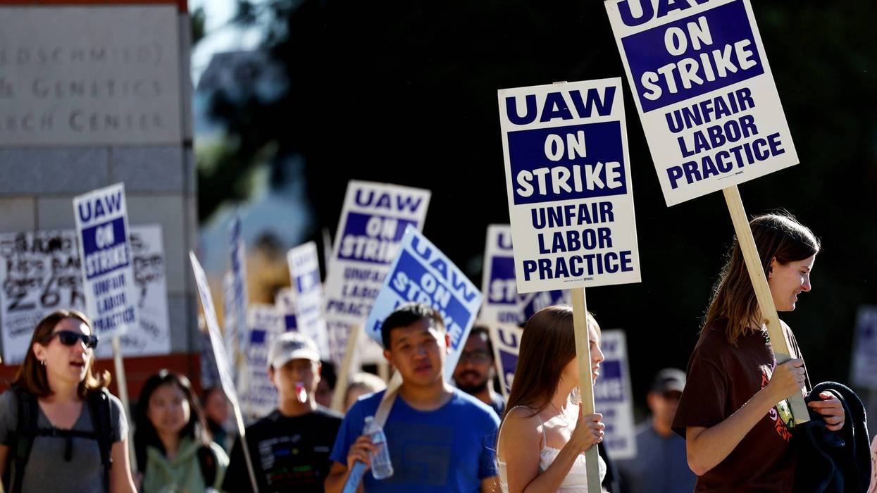 Union academic workers and supporters march and picket at the UCLA campus amid a statewide strike by nearly 48,000 University of California unionized workers on November 15, 2022 in Los Angeles, California.