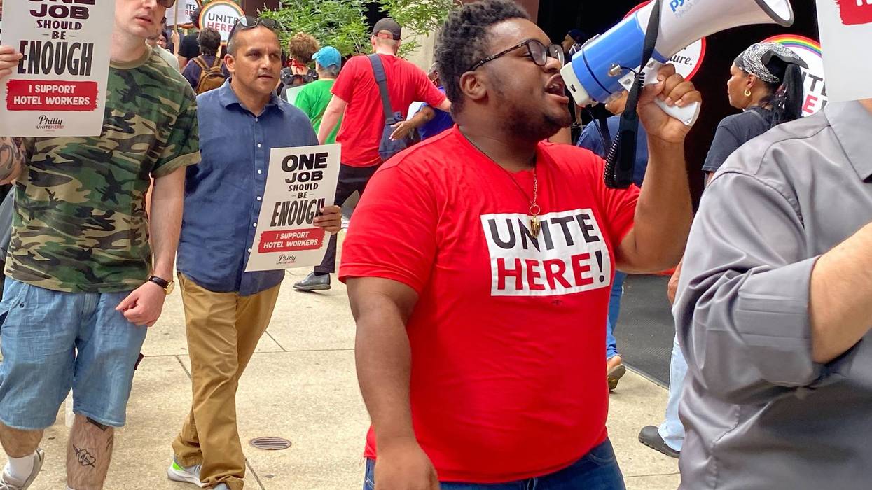 UNITE HERE Local 274 members picket outside the Sheraton Philadelphia Downtown hotel in Center City.
