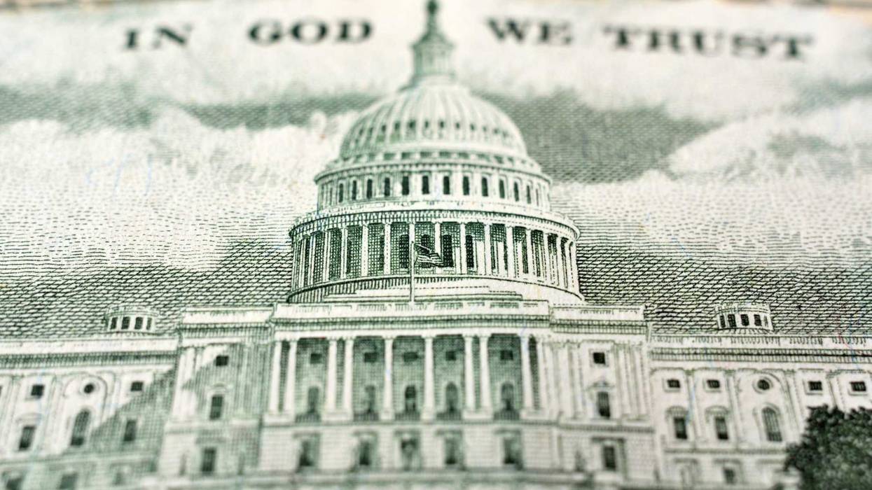 United States fifty dollar bill with the United States Capitol building.