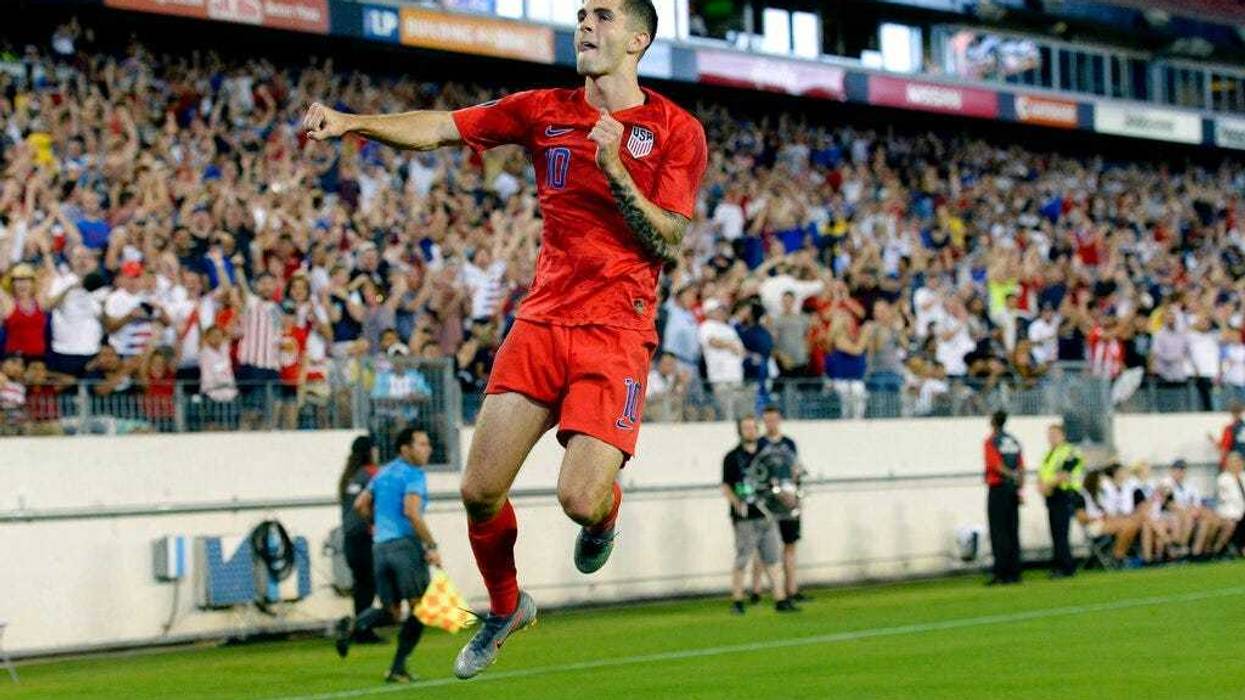 United States midfielder Christian Pulisic celebrates after scoring a goal against Jamaica during the second half of a CONCACAF Gold Cup semifinal soccer match Wednesday, July 3, 2019, in Nashville, Tenn. The United States won 3-1. (
