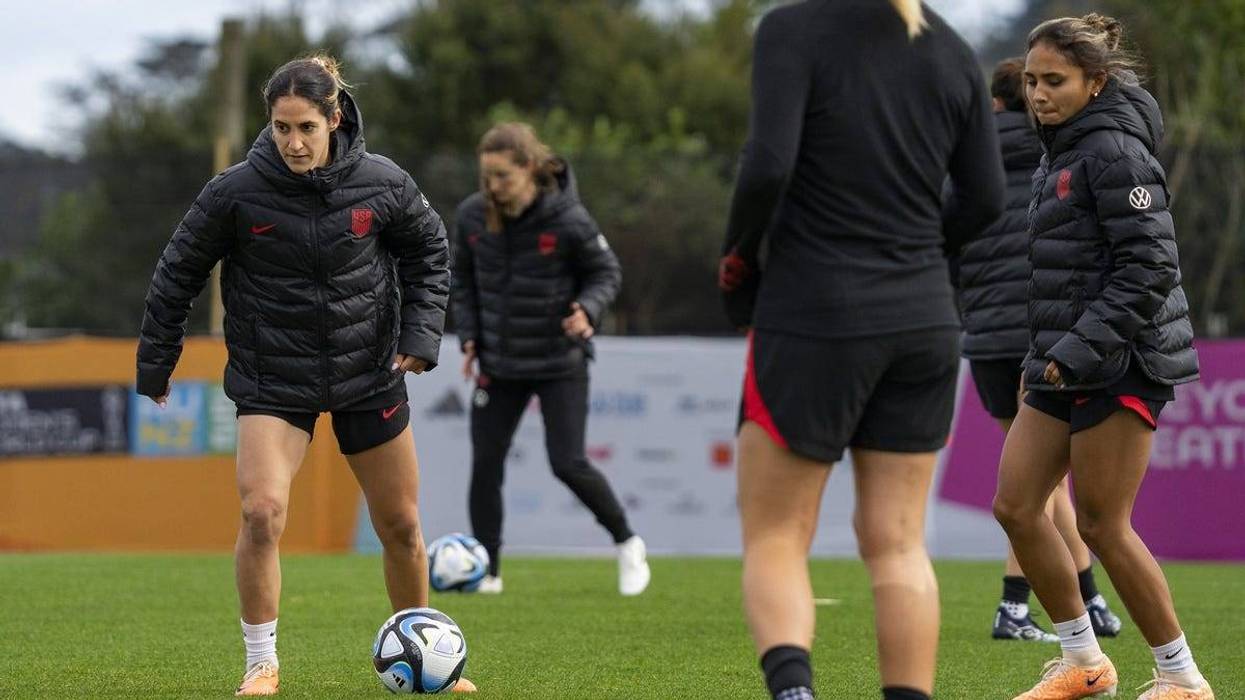 United States midfielder Savannah DeMelo (9), left, works through a drill during a training session at Bay City Park amid the 2023 FIFA Women's World Cup.