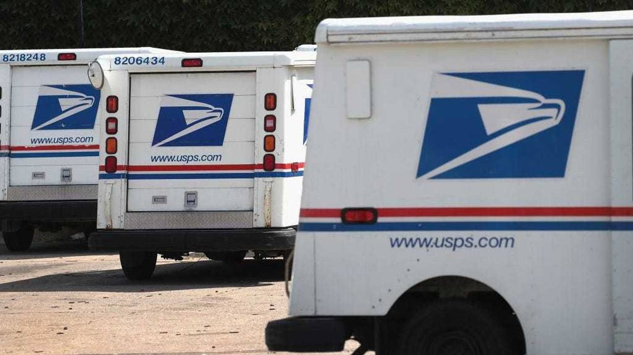 United States Postal Service (USPS) trucks are parked at a postal facility on August 15, 2019 in Chicago, Illinois.