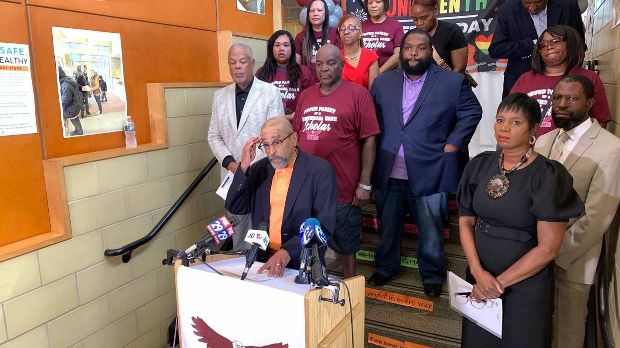 Universal Board Chair Christopher Hill addresses reporters Thursday about the pending closure of Vare Charter School.