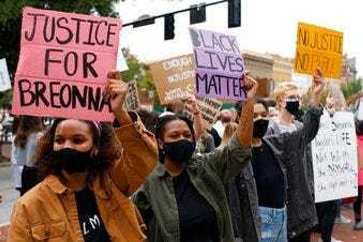 University of Georiga students lead a Black Lives Matter protest in downtown in memory of Breonna Taylor in Athens, Ga., Friday, Sept. 25, 2020. (Joshua L. Jones/Athens Banner-Herald via AP)