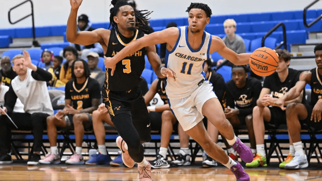 University of New Haven Chargers men's basketball in action. UNH Athletics is moving up to NCAA D-I.