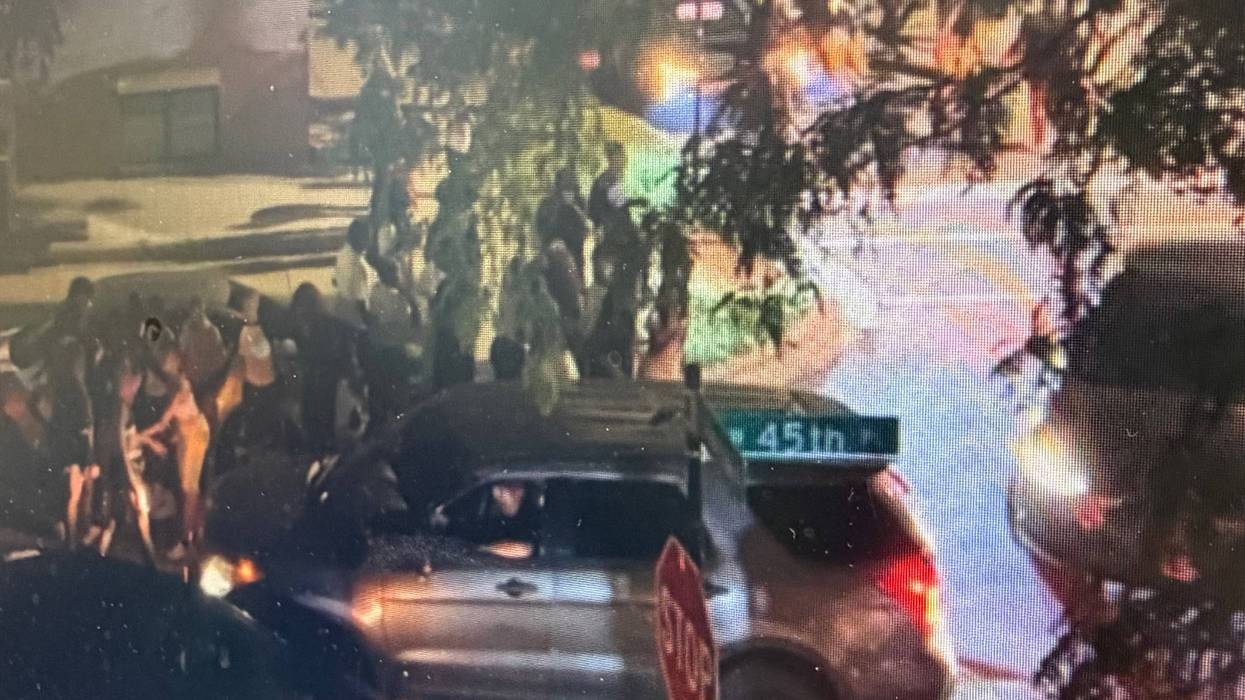 Unmarked Chicago police SUVs respond to a group of a people at 45th and Normal on the Southwest side.