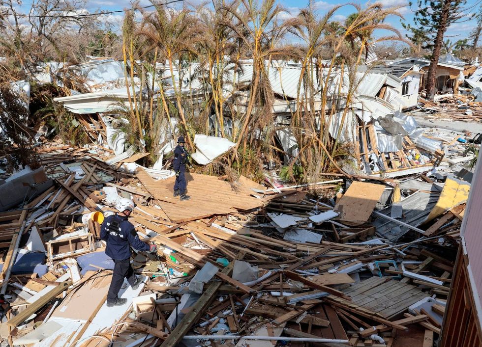Urban search and rescue teams search the damaged homes on Fort Myers Beach on Monday, Oct. 3, 2022.