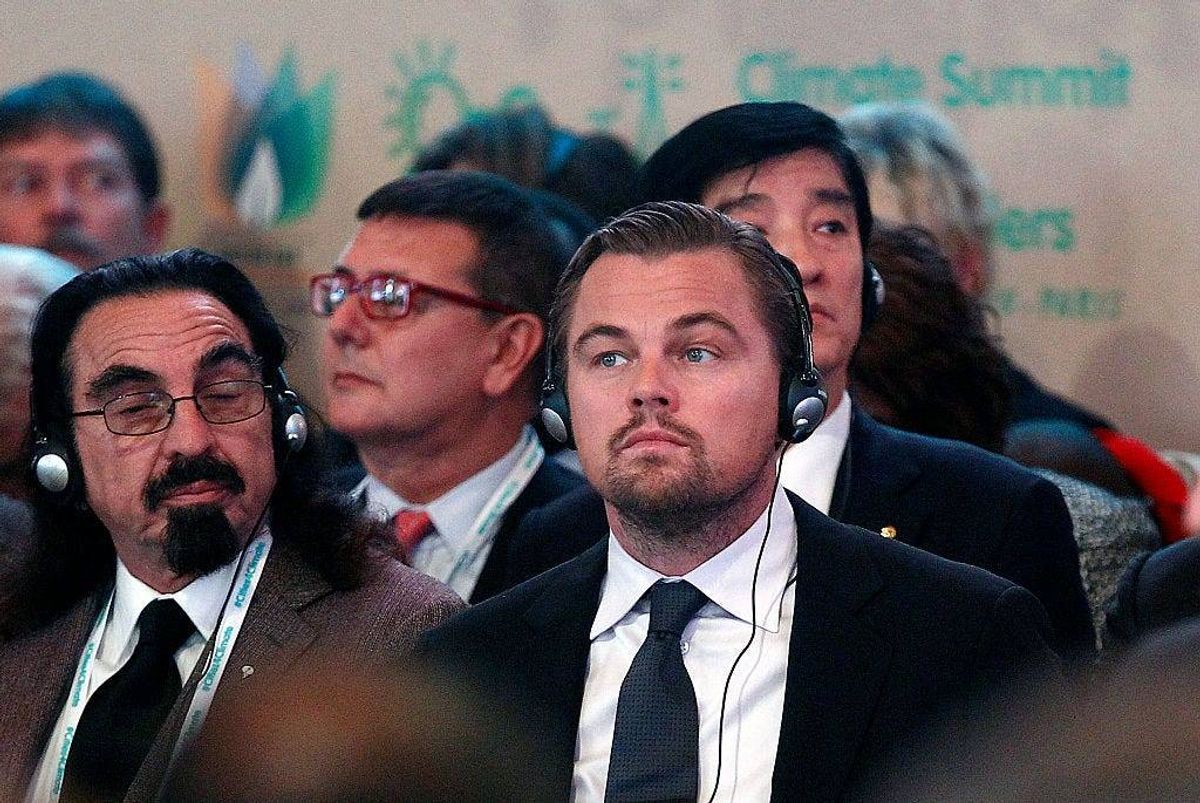 US actor Leonardo DiCaprio (R) and his father George DiCaprio (L) attend a Summit of Local elected for Climate at the Paris city hall on December 04, 2015 in Paris, France.