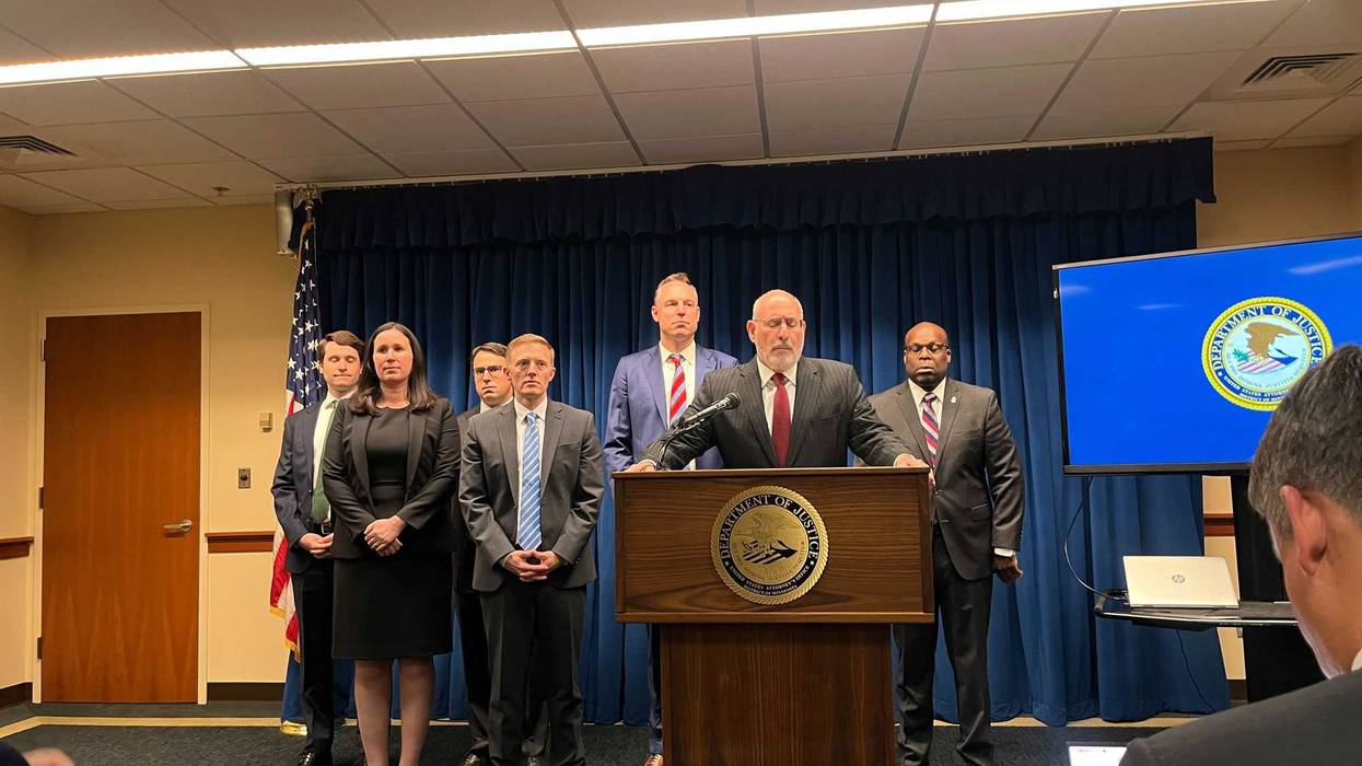 US Attorney Andy Luger announcing charges against five people for attempting to bribe a juror.