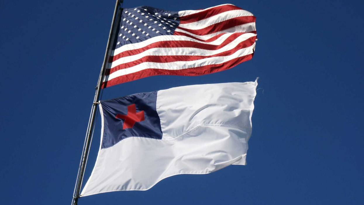 US flag flying above the Christian (Protestant) flag.