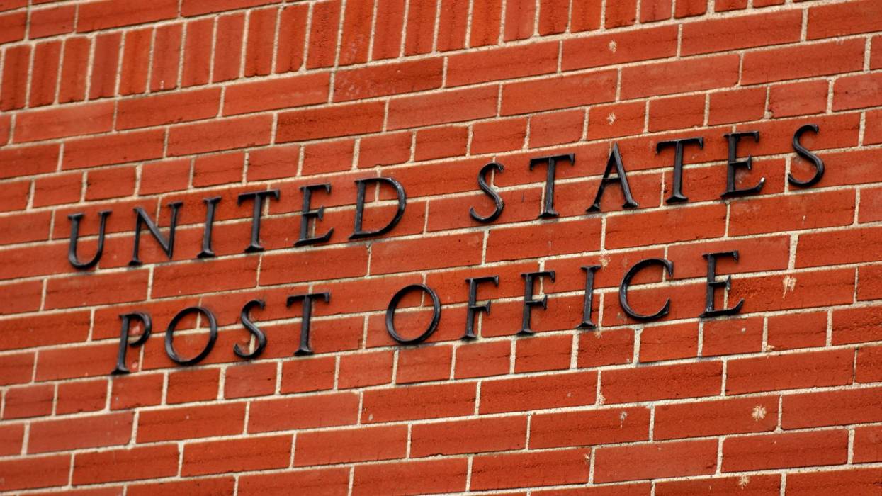 US Post Office Sign on Brick Building - stock photo