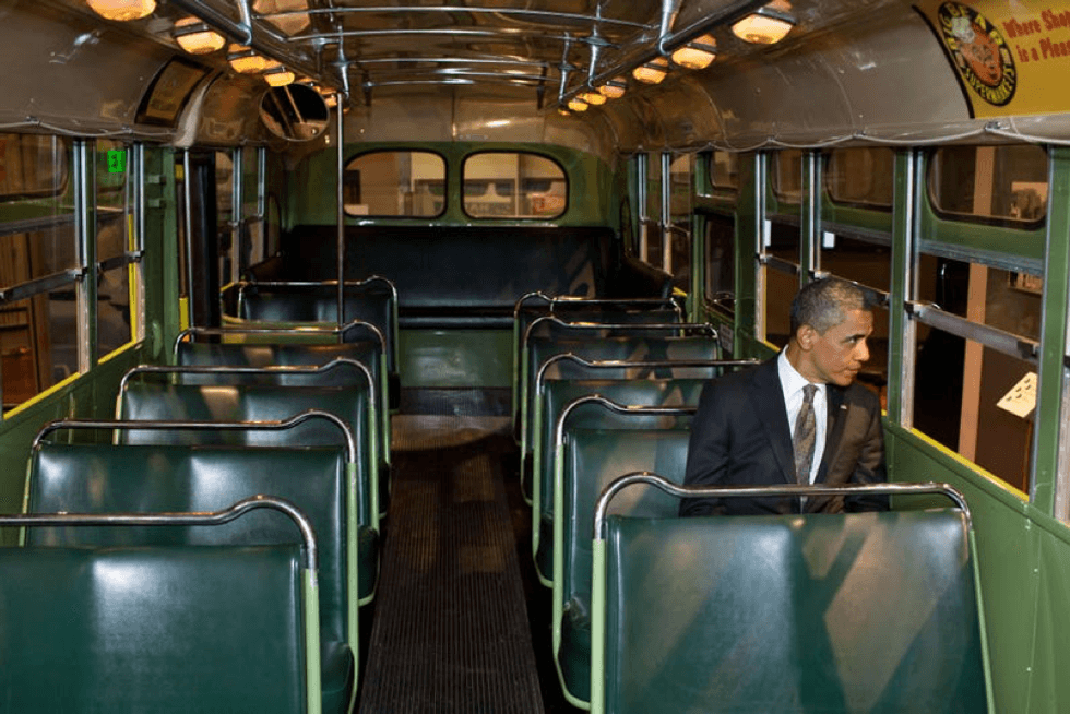 US President Barack Obama sits on the famed Rosa Parks bus at the Henry Ford Museum following an event April 18, 2012 in Dearborn, Michigan.