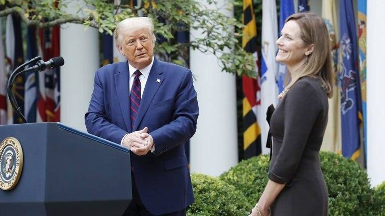 US President Donald J. Trump intriduces Judge Amy Coney Barrett (R) as his nominee to be an Associate Justice of the Supreme Court during a ceremony in the Rose Garden of the White House in Washington, DC