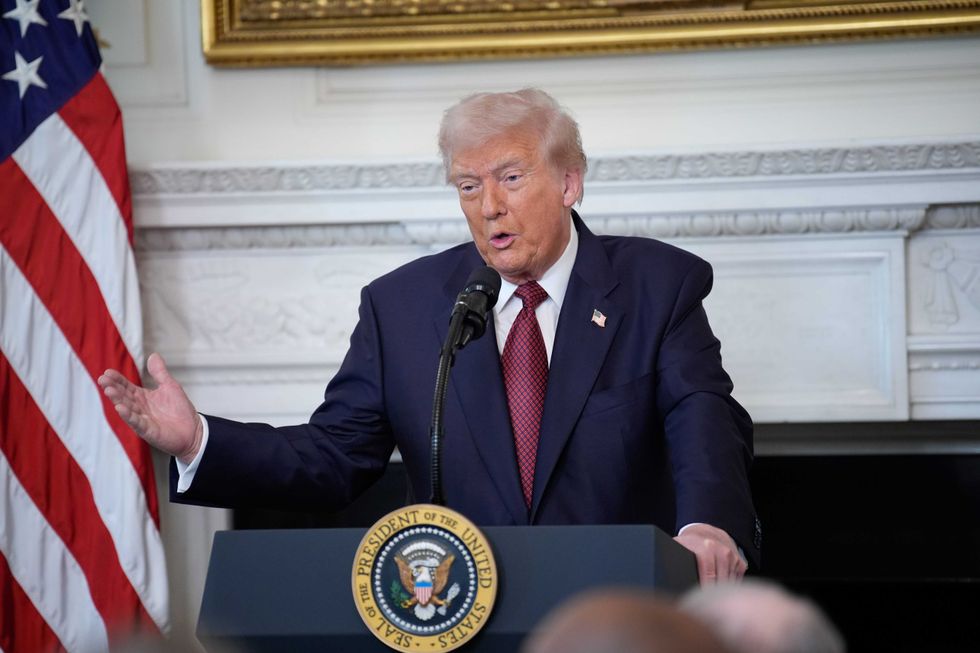 US President Donald Trump delivers remarks at the breakfast with republican senators in the State Dining Room at the White House in Washington on November 5, 2025.