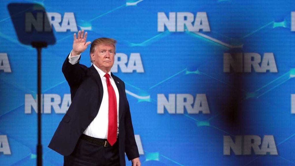 US President Donald Trump waves to the crowd at the NRA-ILA Leadership Forum at the 148th NRA Annual Meetings & Exhibits on April 26, 2019 in Indianapolis, Indiana.