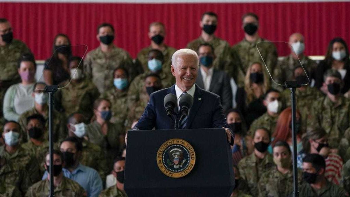 US President Joe Biden addresses US Air Force personnel at RAF Mildenhall in Suffolk, ahead of the G7 summit in Cornwall, on June 9, 2021 in Mildenhall, England.