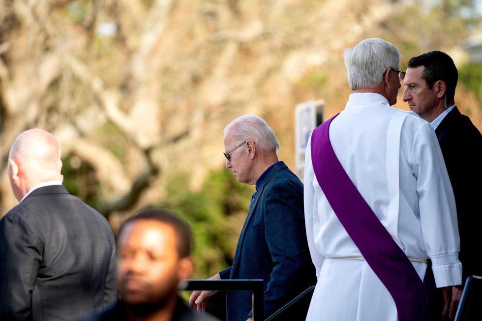 US President Joe Biden departs Saint Edmond Catholic Church in Rehoboth Beach, Delaware, on March 19, 2022.