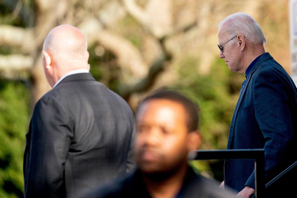 US President Joe Biden departs Saint Edmond Catholic Church in Rehoboth Beach, Delaware, on March 19, 2022.