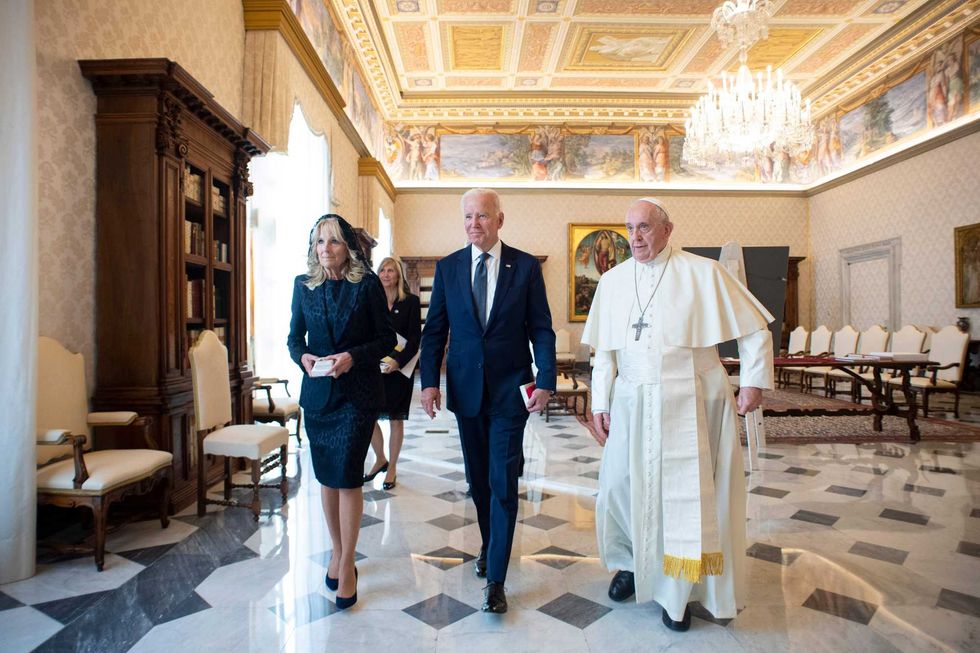 US President Joe Biden, first lady Jill Biden and Pope Francis walk as they meet at the Vatican, Friday, Oct. 29, 2021