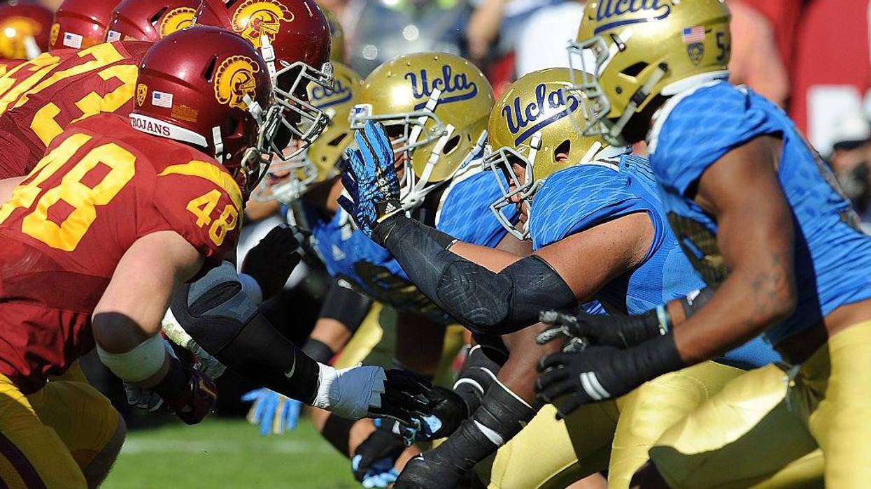 USC Trojans and the UCLA Bruins in action during a game played at the Los Angeles Memorial Coliseum.