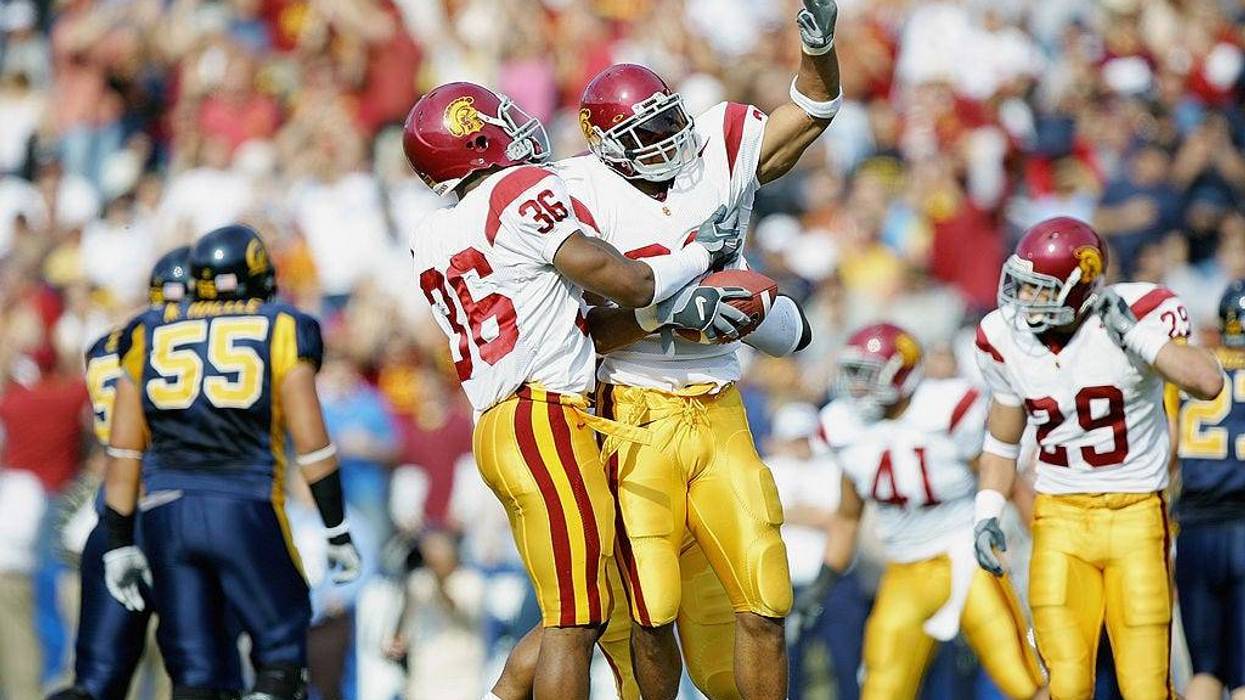 USC Trojans celebrate an interception against the California Golden Bears at Memorial Stadium on November 12, 2005, in Berkeley, California.