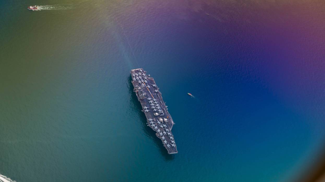 US may add aircraft carrier, 10,000 troops to Mideast: official