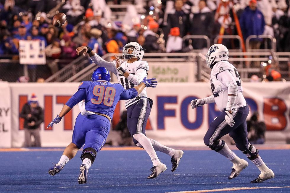 Utah State QB Jordan Love throwing under duress