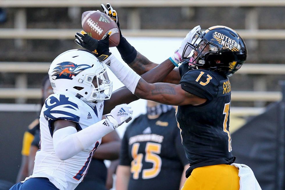 UTSA Roadrunners cornerback Tariq Woolen (20) breaks up a pass intended for Southern Miss Golden Eagles wide receiver Antoine Robinson (13) in the second quarter at M.M. Roberts Stadium.