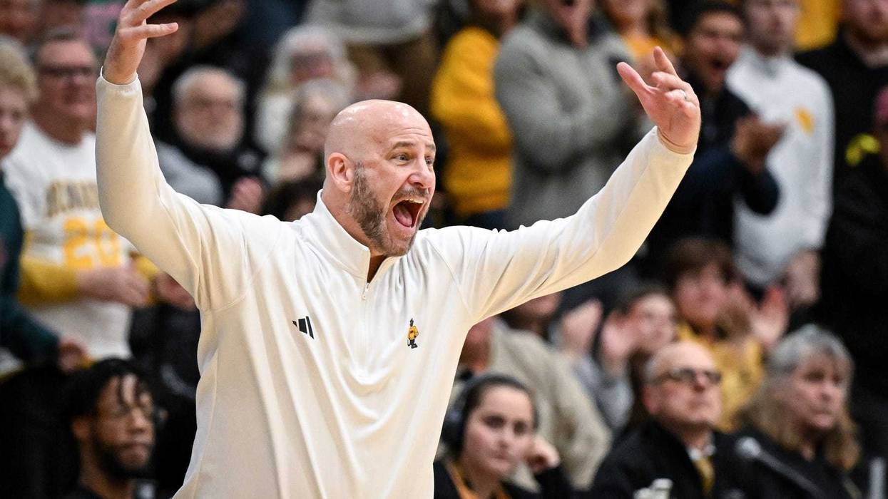 UW-Milwaukee Panthers coach Bart Lundy gets excited during the second half of a Horizon League quarterfinal against the Oakland Golden Grizzlies on Thursday, March 6, 2025, at the Klotsche Center in Milwaukee, Wisconsin.