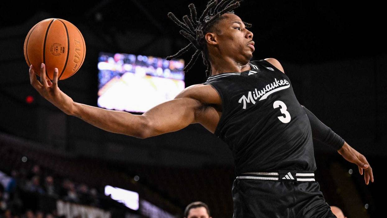 UW-Milwaukee Panthers forward Jamichael Stillwell (3) saves the ball from going out of bounds against the Oakland Golden Grizzlies during the first half in a game Thursday, February 27, 2025, at the UWM Panther Arena in Milwaukee, Wisconsin.