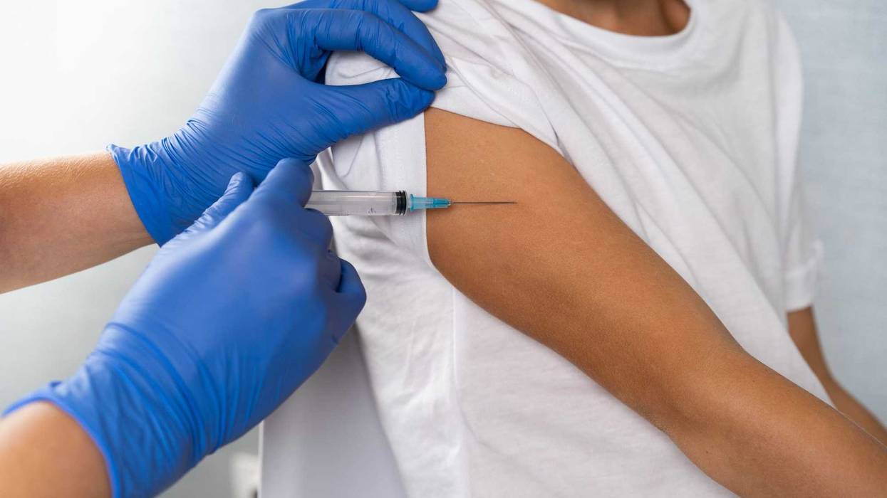 vaccination of children, a little boy at a doctor's appointment, an injection in the arm, children's medicine, an injection in the arm.