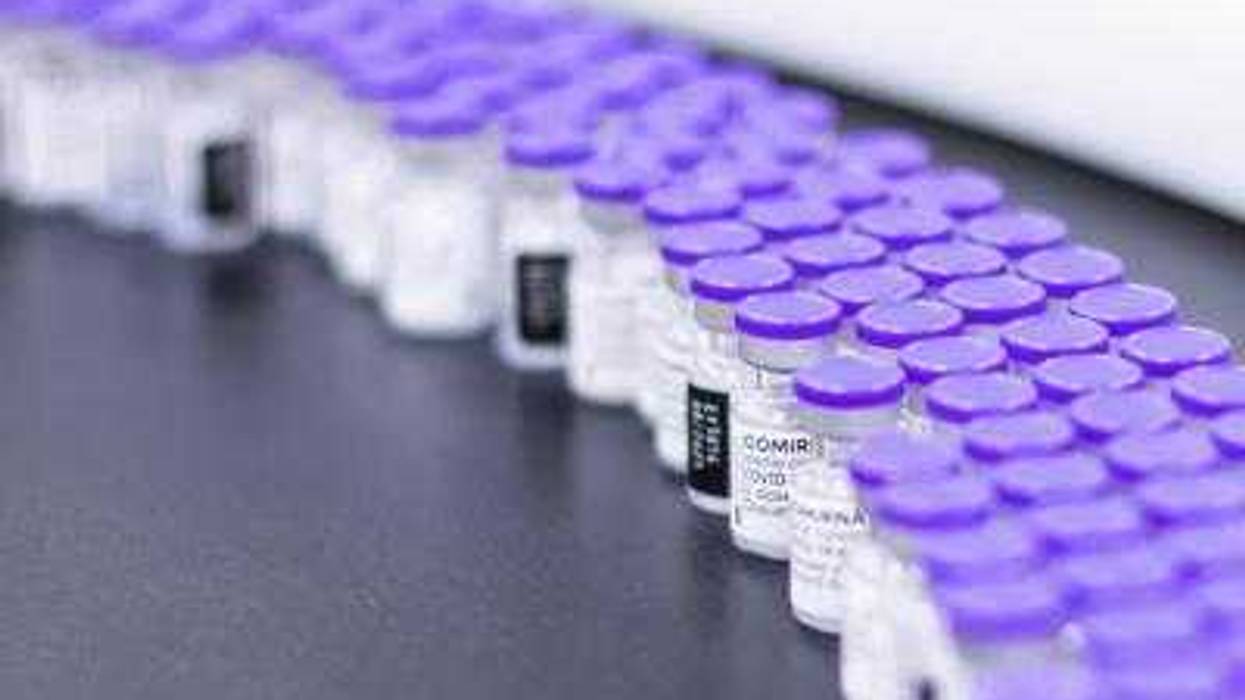 Vaccine booster vials at a pharmaceutical factory