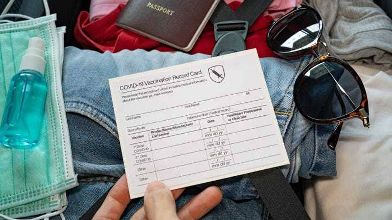 Vaccine card in a suitcase.