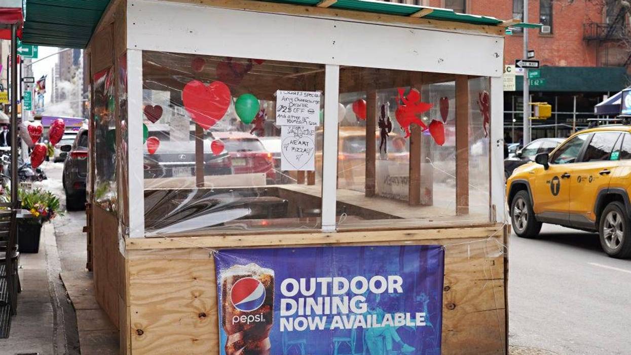 Valentine's Day decorations are displayed on an outdoor dining structure on February 14, 2021 in New York City.