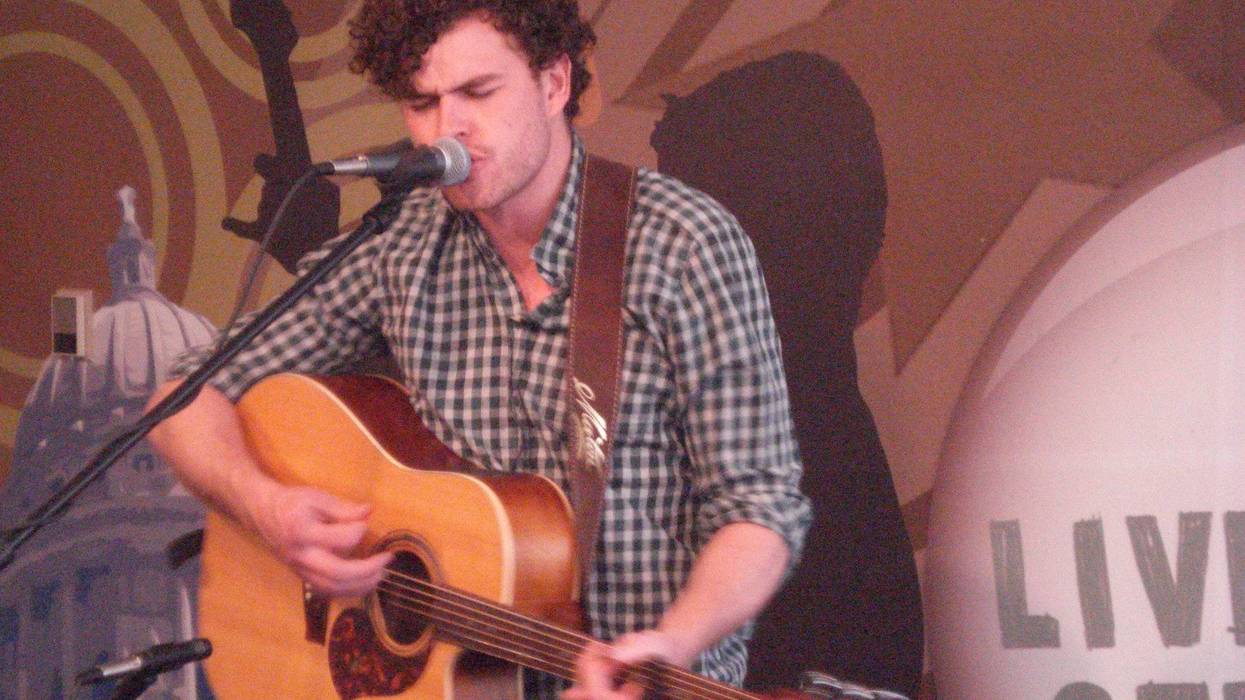 Vance Joy with guitar in Studio M