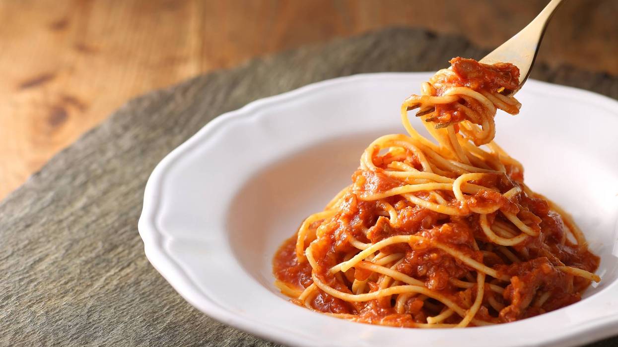 Various types of pasta with tomato sauce