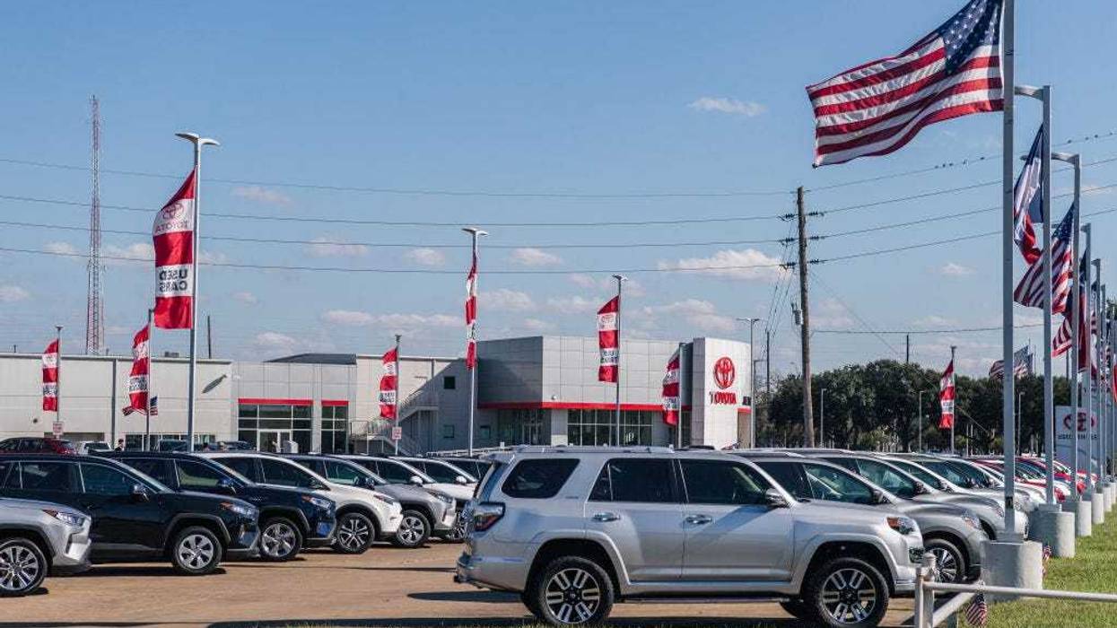 Vehicles sit on the lot at the Joe Myers Toyota dealership on January 04, 2022 in Houston, Texas. Toyota Motor Corp has been ranked the No. 1 automaker in America after surpassing General Motors in auto sales for the first time since 1931. Automakers reported Toyota having sold 2.332 million vehicles in the United States, in 2021, compared to 2.218 million for General Motors. (Photo by Brandon Bell/Getty Images)