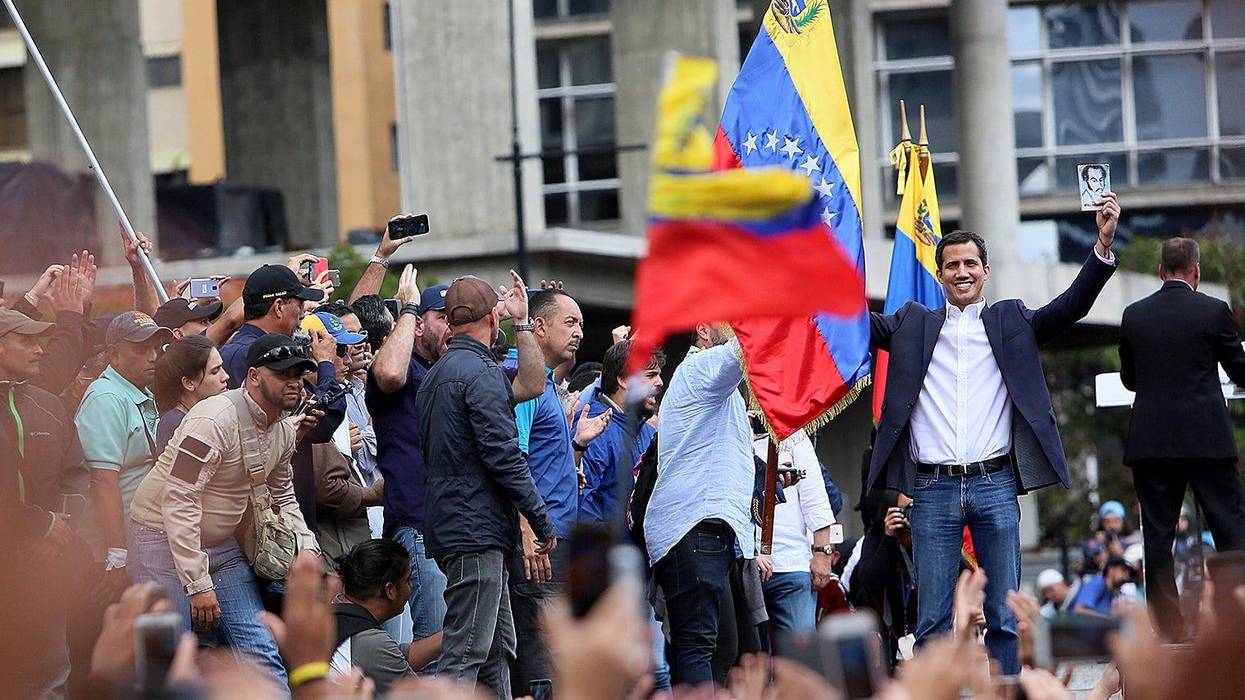 Venezuelan opposition leader and head of the National Assembly Juan Guaido declares self interim president as thousands of people protest against Nicolás Maduro on January 23, 2019 in Caracas, Venezuela.