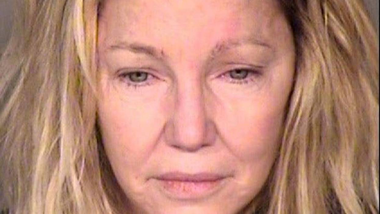 VENTURA, CA - JUNE 24: (EDITORS NOTE: Best quality available) In this handout photo provided by the Ventura County Sheriffs Office, actress Heather Locklear is seen in a police booking photo after her arrest on two counts of misdemeanor battery on a polic
