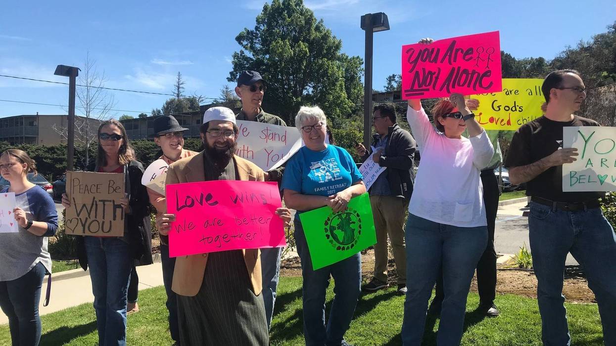 Ventura County residents gather in solidarity with local Muslims at the Islamic Center of Conejo Valley in Thousand Oaks Friday afternoon