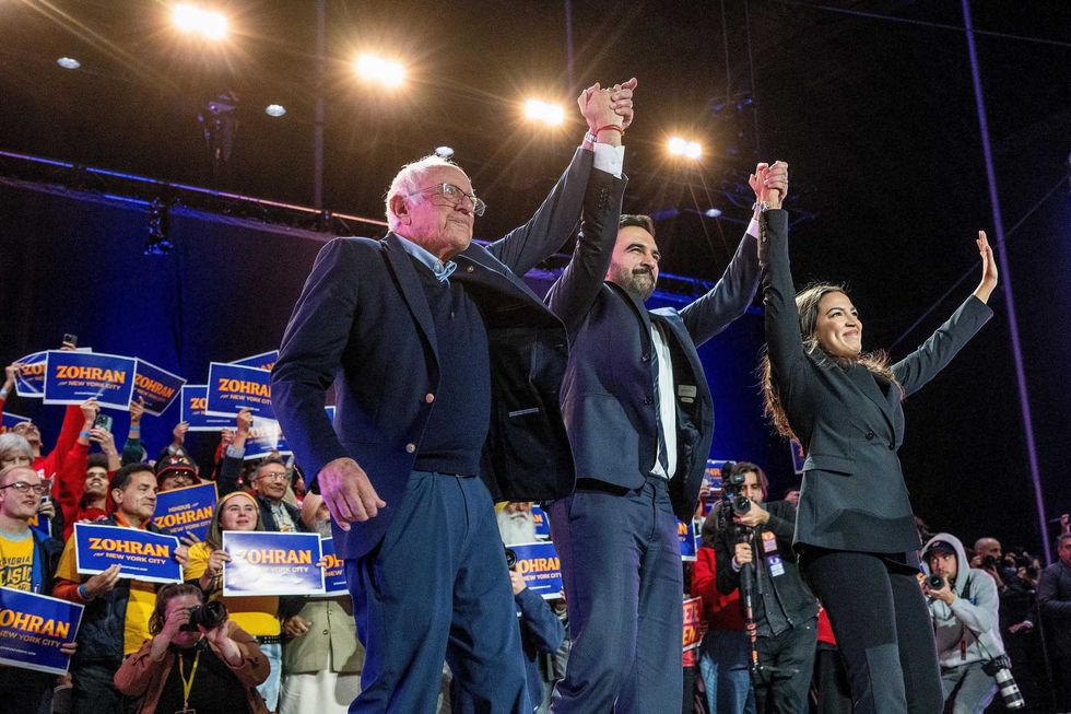 Vermont Senator Bernie Sanders, from left, New York mayoral candidate Zohran Mamdani, and Representative Alexandria Ocasio-Cortez during a campaign event at Forest Hills Stadium in New York on Oct. 26