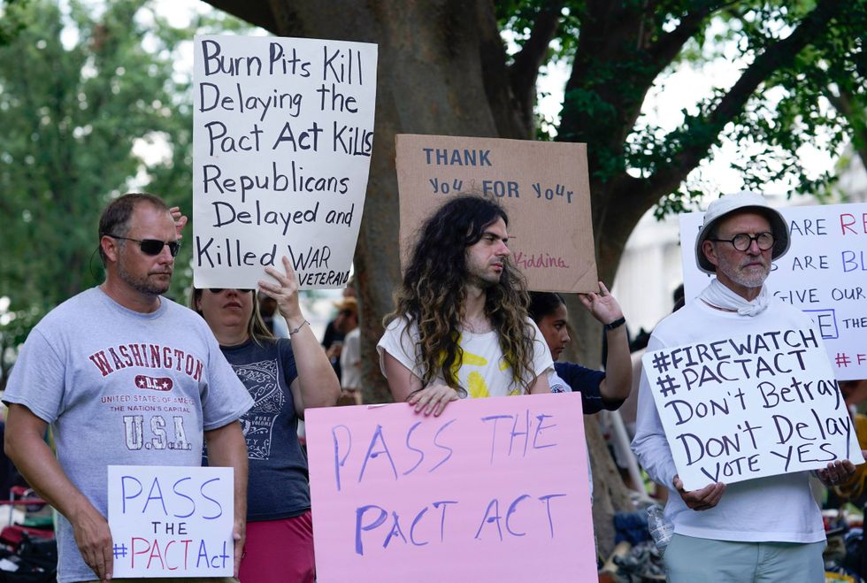 Veterans, military family members and advocates rally outside the Capitol in Washington, Tuesday, Aug. 2, 2022, in support of a bill that enhances health care and disability benefits for millions of veterans exposed to the toxic burn pits.